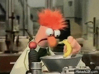 Muppet Beeker putting a banana into some sort of scientific funnel