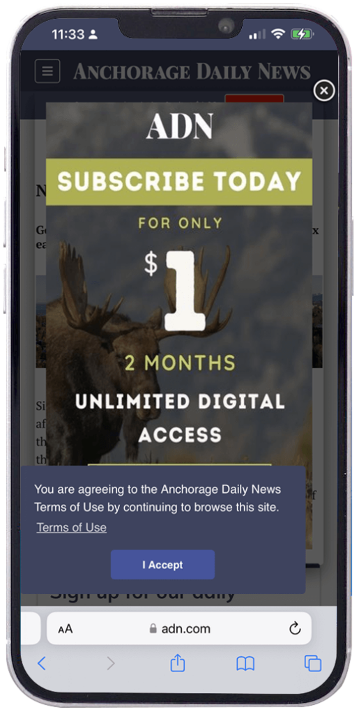 Anchorage Daily News landing page on mobile. the screen is totally obscured by pop-ups